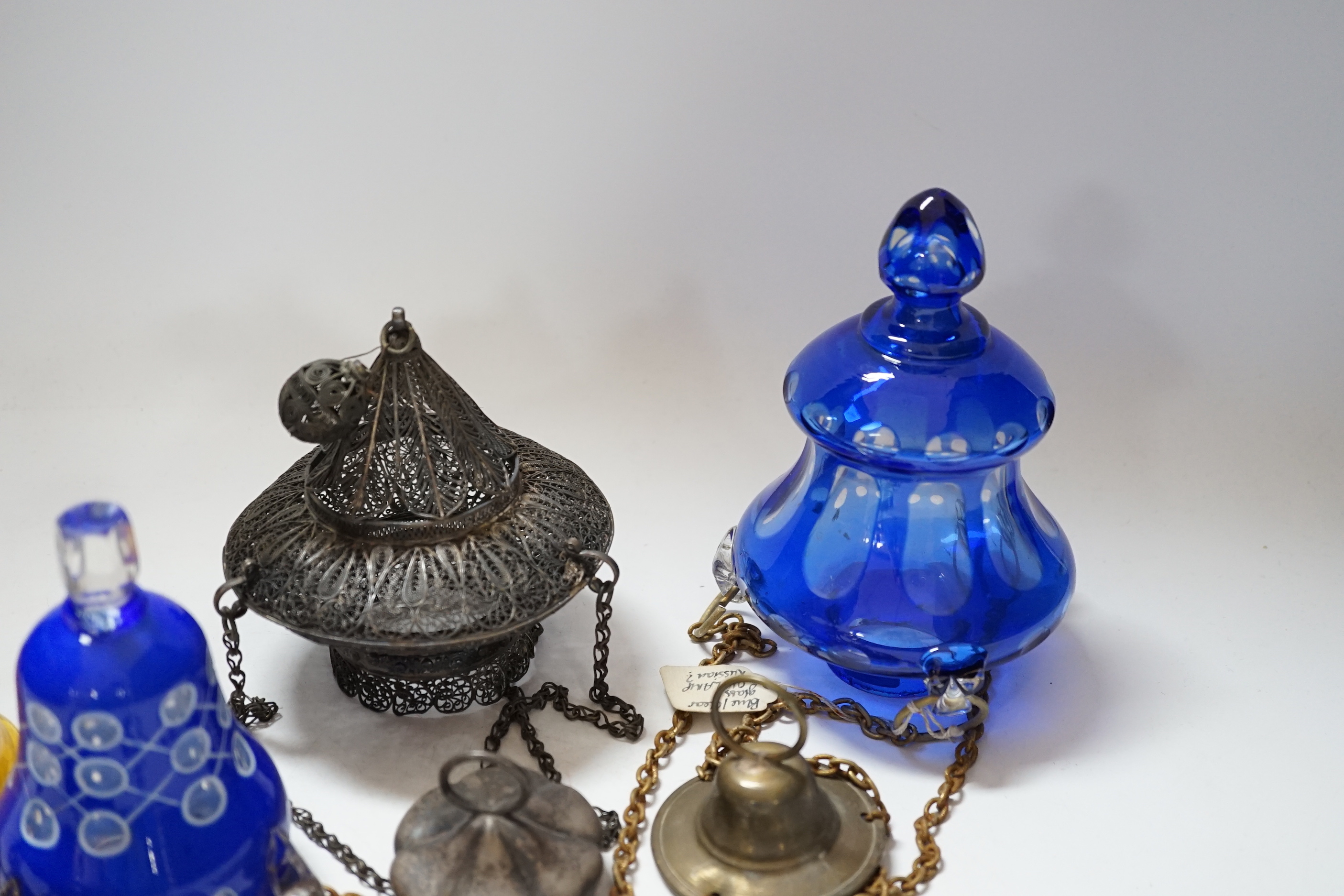 A group of assorted incense lamps